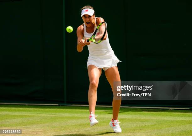 Sorana Cirstea of Romania in action against Evgeniya Rodina of Russia in the second round of the Ladies Singles at the All England Lawn Tennis and...