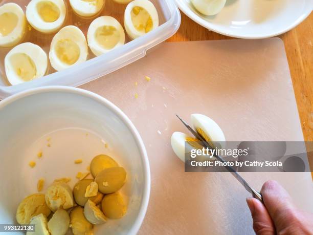 making deviled eggs - deviled egg stock pictures, royalty-free photos & images
