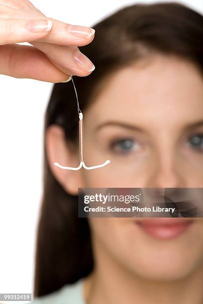 iud contraceptive - iud stock pictures, royalty-free photos & images