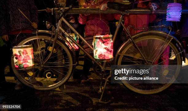 Children hold lanterns in their hands during the St. Martin's parade in Stuttgart, Germany, 08 November 2017. Already before the actual St. Martin's...