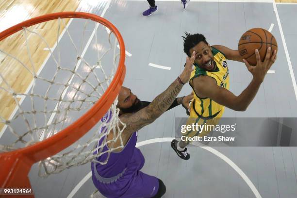 Josh Childress of Ball Hogs shoots against Carlos Boozer of Ghost Ballers during week three of the BIG3 three on three basketball league game at...