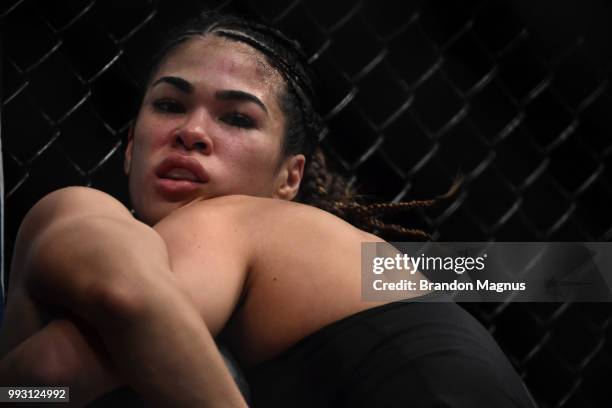 Montana De La Rosa pushes Rachael Ostovich up against the cage in their women's flyweight bout during The Ultimate Fighter Finale event inside The...