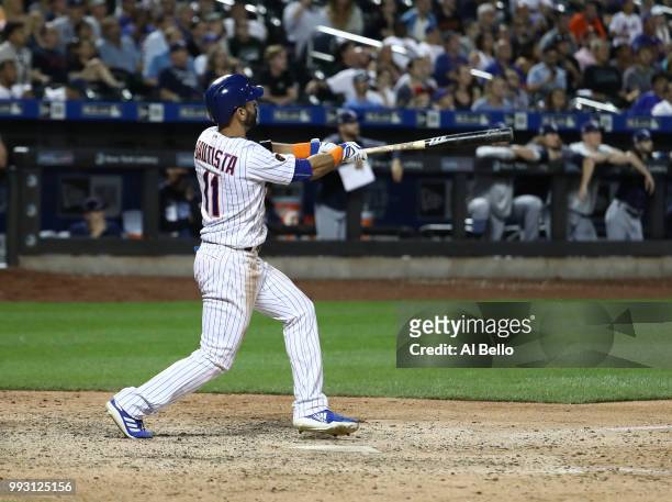Jose Bautista of the New York Mets hits a walk off Grand Slam home run against the Tampa Bay Rays during their game at Citi Field on July 6, 2018 in...