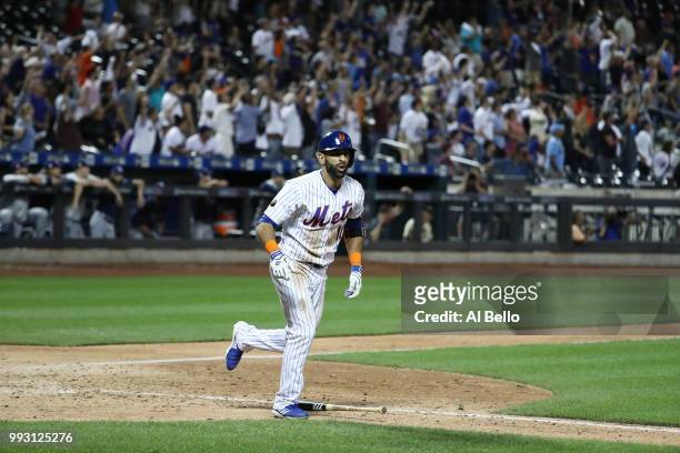 Jose Bautista of the New York Mets hits a walk off Grand Slam home run against the Tampa Bay Rays during their game at Citi Field on July 6, 2018 in...