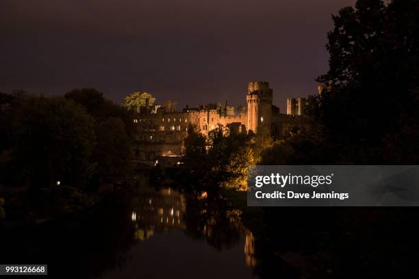 warwick castle at night - warwick castle stock pictures, royalty-free photos & images