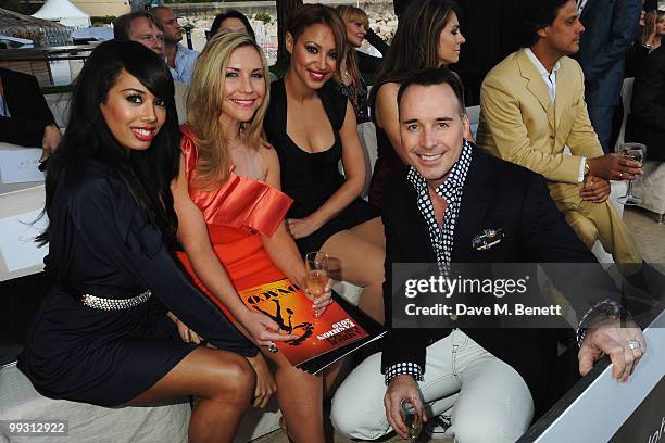 Jade Ewen, Heidi Range and Amelle Berrabah of the Sugababes meet with David Furnish at the Amber Fashion Show and Auction held at the Meridien Beach...