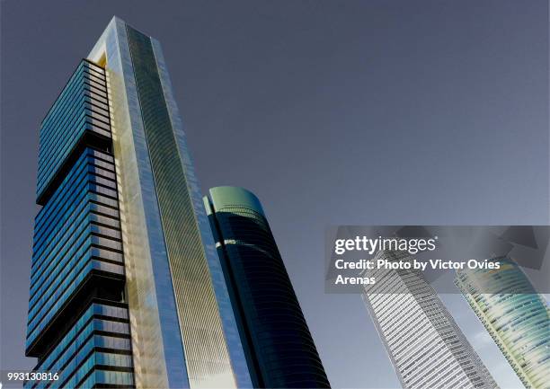 up to the sky... cuatro torres business area (four towers business area) in madrid, spain - madrid financial district stock pictures, royalty-free photos & images