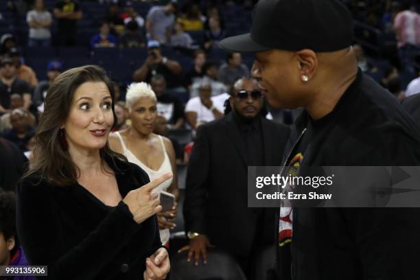 Oakland Mayor Libby Schaaf speaks with actor LL Cool J during week three of the BIG3 three on three basketball league game at ORACLE Arena on July 6,...