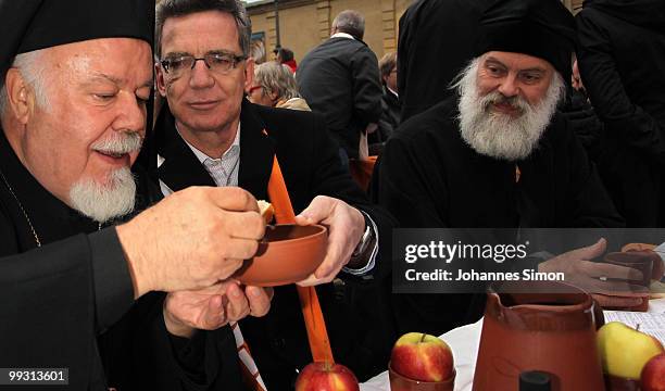 German home secretary Thomas de Maiziere participates in the celebration of Greek orthodox vespers during day 3 of the 2nd Ecumenical Church Day at...