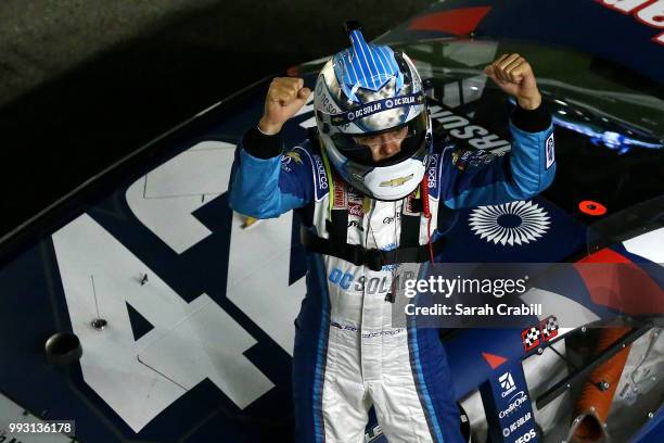 Kyle Larson, driver of the DC Solar Chevrolet, celebrates after winning the NASCAR Xfinity Series Coca-Cola Firecracker 250 at Daytona International...