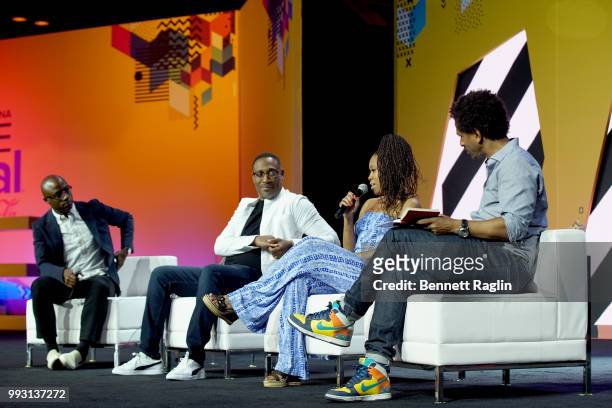 George Tillman, Jr., Barry Jenkins, Regina King, and Touré speak onstage at 'If Beale Street Could Talk' Movie Cast and Filmmakers at Essence...