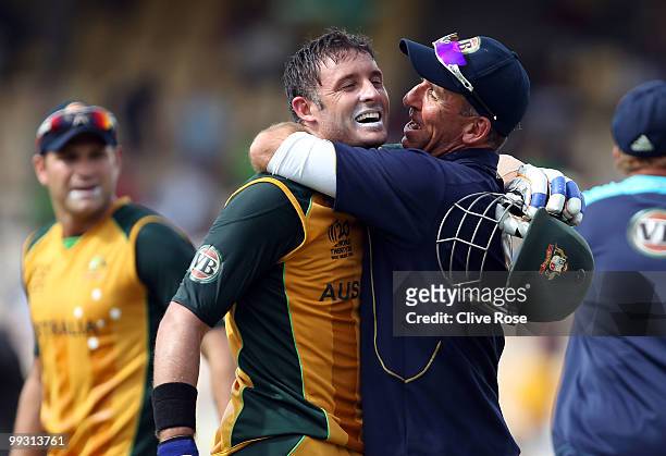 Michael Hussey of Australia celebrates with Tim Nielsen after the ICC World Twenty20 semi final between Australia and Pakistan at the Beausjour...