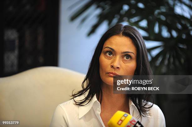 Charlotte Lewis, an actress from London, holds a press conference at her lawyer's offices in Los Angeles May 14, 2010. Lewis, who appeared in Roman...