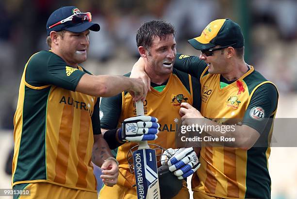 Michael Hussey of Australia celebrates with Michael Clarke after the ICC World Twenty20 semi final between Australia and Pakistan at the Beausjour...