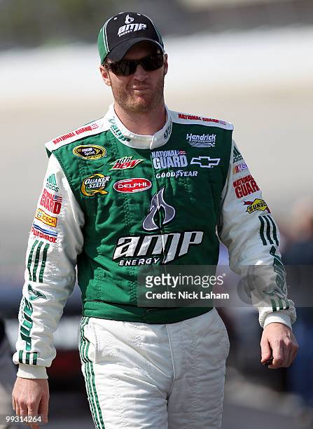 Dale Earnhardt Jr., driver of the AMP Energy/National Guard Chevrolet, stands on the grid during qualifying for the NASCAR Sprint Cup Series Autism...