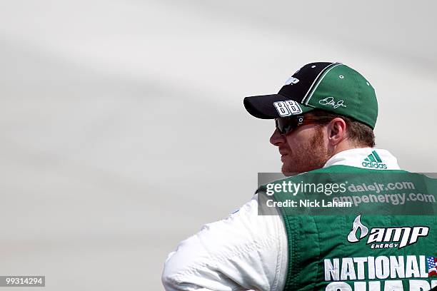 Dale Earnhardt Jr., driver of the AMP Energy/National Guard Chevrolet, stands on the grid during qualifying for the NASCAR Sprint Cup Series Autism...