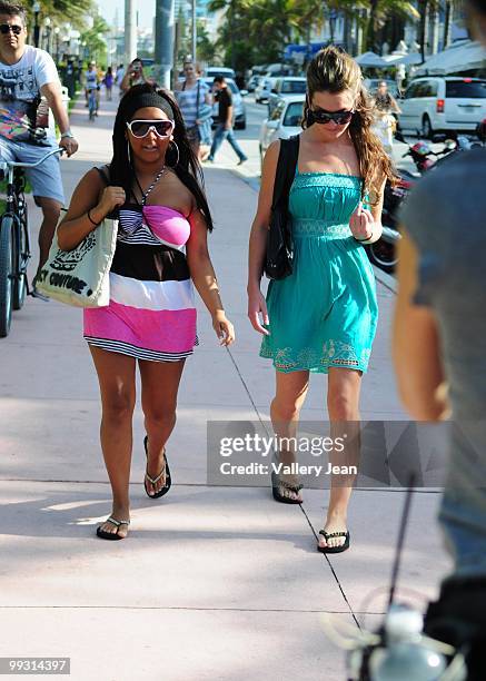 Nicole "Snooki" Polizzi and a friend are seen on May 13, 2010 in Miami Beach, Florida.
