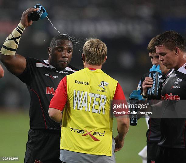 The Beast Mtawarira and John Smit CAP have a water break during the Super 14 match between the Sharks and Western Force held at Absa Stadium on May...