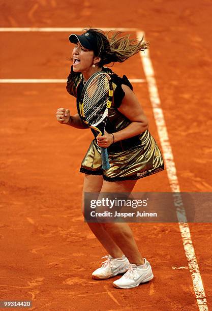 Aravane Rezai of France celebrates matchpoint over Jelena Jankovic of Serbia in their quarter final match during the Mutua Madrilena Madrid Open...