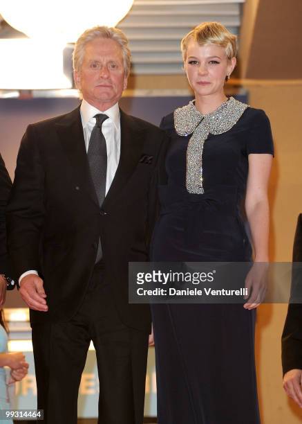Actors Michael Douglas and Carey Mulligan depart the Premiere of 'Wall Street: Money Never Sleeps' held at the Palais des Festivals during the 63rd...