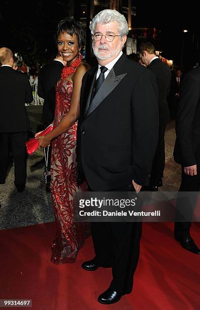 Mellody Hobson and writer/director George Lucas depart the Premiere of 'Wall Street: Money Never Sleeps' held at the Palais des Festivals during the...