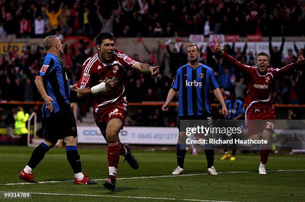 Charlie Austin of Swindon celebrates scoring the opening goal during the Coca-Cola League One Playoff Semi Final 1st leg match between Swindon Town...