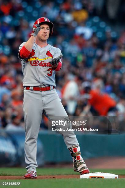 Jedd Gyorko of the St. Louis Cardinals celebrates after hitting a triple against the San Francisco Giants during the second inning at AT&T Park on...
