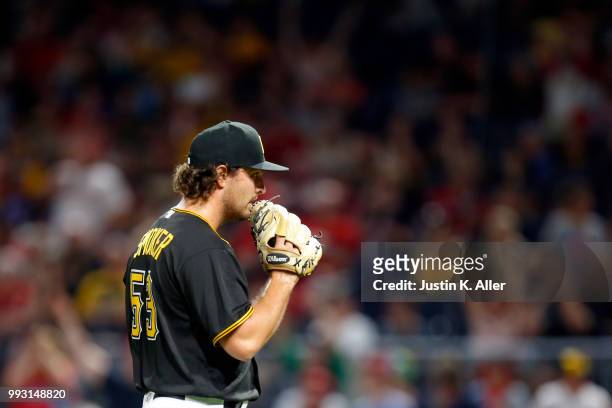 Josh Smoker of the Pittsburgh Pirates reacts after giving up a three run home run in the seventh inning against the Philadelphia Phillies at PNC Park...