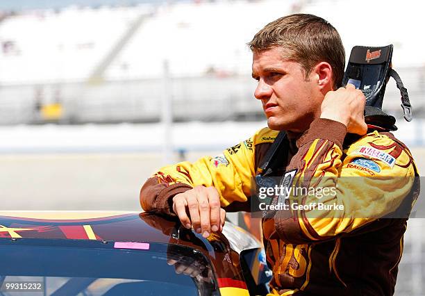 David Ragan, driver of the UPS Ford,gets out of his car after qualifying for the NASCAR Sprint Cup Series Autism Speaks 400 at Dover International...