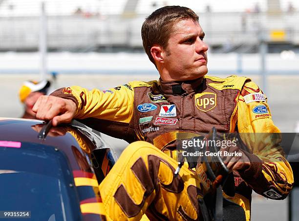 David Ragan, driver of the UPS Ford,gets out of his car after qualifying for the NASCAR Sprint Cup Series Autism Speaks 400 at Dover International...