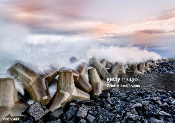 tetra pod tsunami wall - japan earthquake stock pictures, royalty-free photos & images