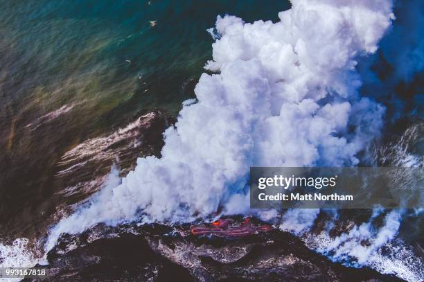 lava + sea = lots of steam - northam stock pictures, royalty-free photos & images