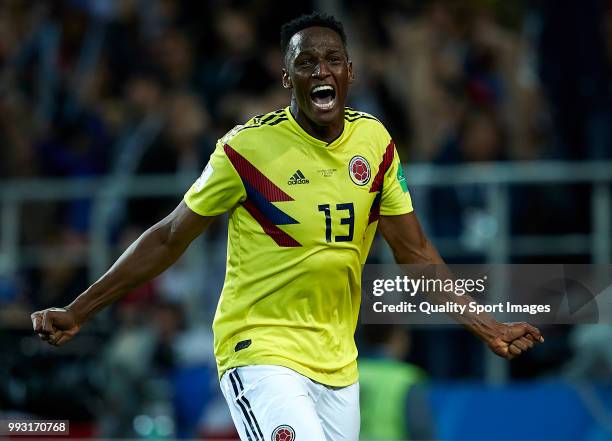 Yerry Mina of Colombia celebrates after scoring his team's first goal during the 2018 FIFA World Cup Russia Round of 16 match between Colombia and...