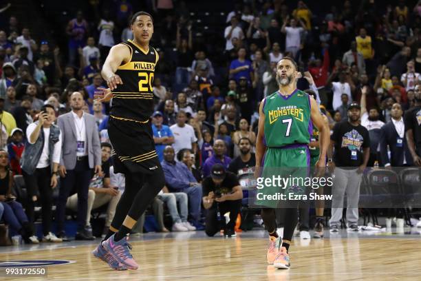 Mahmoud Abdul-Rauf of 3 Headed Monsters watches his game winning three-point basket against Killer 3's during week three of the BIG3 three on three...