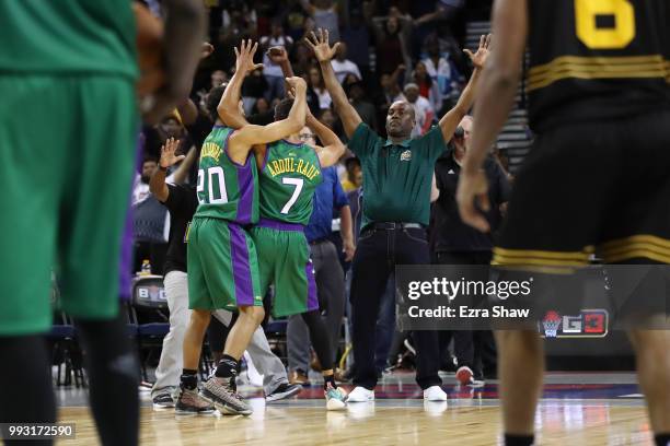 Mahmoud Abdul-Rauf of 3 Headed Monsters celebrates with his team after his game winning three-point basket against Killer 3's during week three of...
