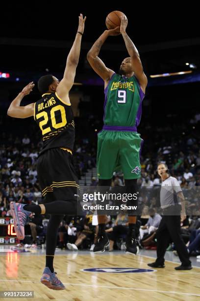 Rashard Lewis of 3 Headed Monsters takes a shot over Ryan Hollins of Killer 3's during week three of the BIG3 three on three basketball league game...