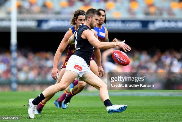 Marc Murphy of Carlton breaks away from the defence during the round 16 AFL match between the Brisbane Lions and the Carlton Blues at The Gabba on...