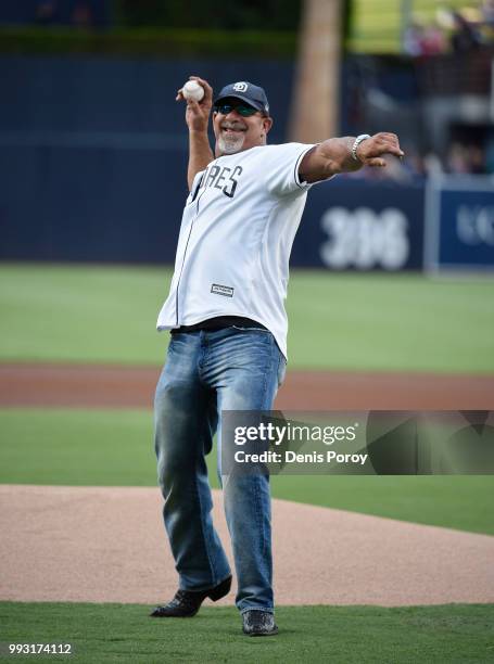 Former wrestler Bill Goldberg throws out the first pitch before a baseball game between the San Diego Padres and the Pittsburgh Pirates at PETCO Park...