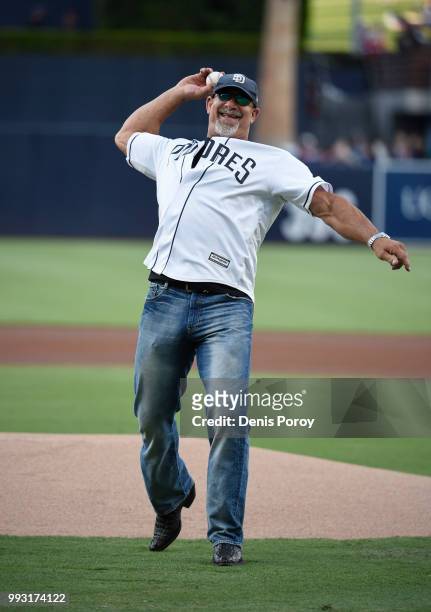 Former wrestler Bill Goldberg throws out the first pitch before a baseball game between the San Diego Padres and the Pittsburgh Pirates at PETCO Park...
