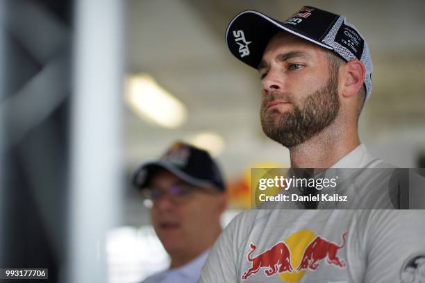 Shane Van Gisbergen driver of the Red Bull Holden Racing Team Holden Commodore ZB looks on during Qualifying for race 17 for the Supercars Townsville...