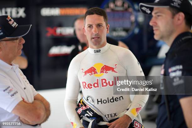 Jamie Whincup driver of the Red Bull Holden Racing Team Holden Commodore ZB looks on during Qualifying for race 17 for the Supercars Townsville 400...