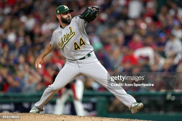 Oakland Athletics pitcher Chris Hatcher delivers a pitch to the plate during the eighth inning of the Major League Baseball game between the Oakland...