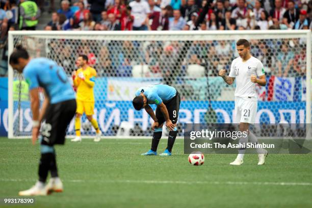 Luis Suarez of Uruguay players react after their 0-2 defeat in the 2018 FIFA World Cup Russia Quarter Final match between Uruguay and France at...