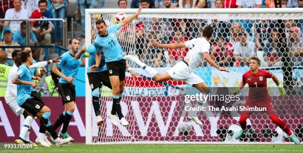 Raphael Varane of France heads to score the opening goal during the 2018 FIFA World Cup Russia Quarter Final match between Uruguay and France at...