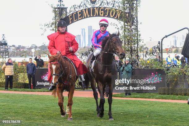 Luke Nolen returns to the mounting yard on Good 'n' Fast after winning the Taj Rossi Series Final at Flemington Racecourse on July 07, 2018 in...