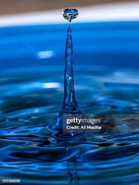 water drop - high speed photography stock pictures, royalty-free photos & images