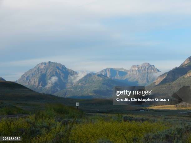 mountains early in yellowstone - christopher gibson stock pictures, royalty-free photos & images