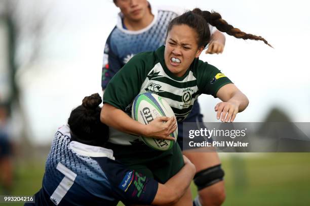 Arihiana Marino-Tauhinu of Manurewa is tackled during the women's Rugby match between Manurewa and College Rifles at Mountford Park on July 7, 2018...