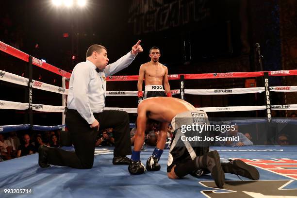 Ernesto Guerrero is knocked out in the fifth round by Rigoberto Hermosillo during the Super Featherweight fight of LA Fight Club at The Belasco...