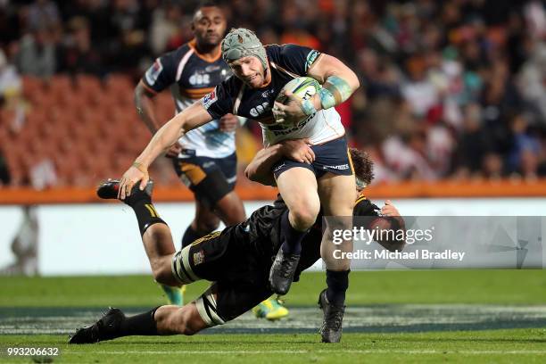 Brumbies David Pocock is tackled during the round 18 Super Rugby match between the Chiefs and the Brumbies at FMG Stadium Waikato on July 7, 2018 in...